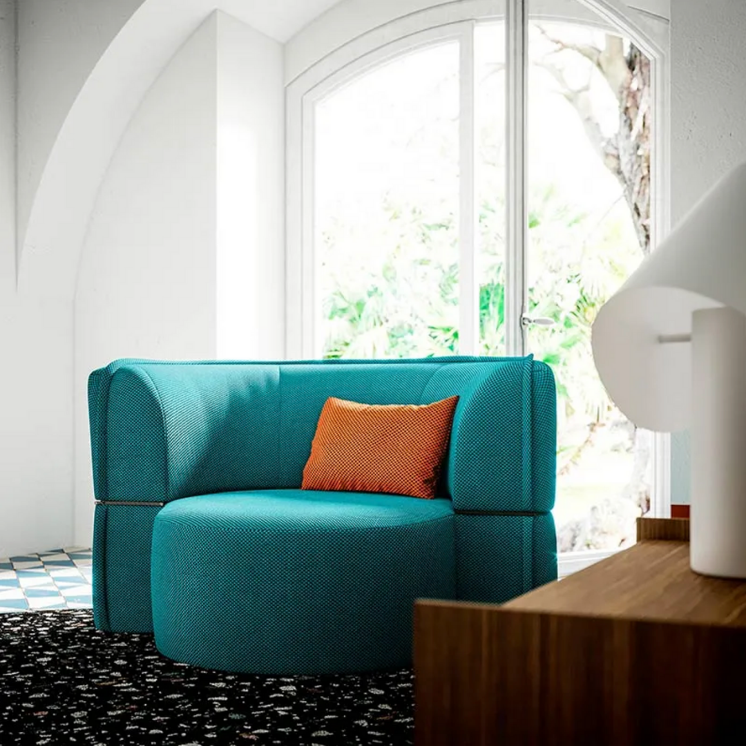 Luxury lounge armchair from Royal Interiors Singapore — designer seating crafted for modern comfort and timeless style.