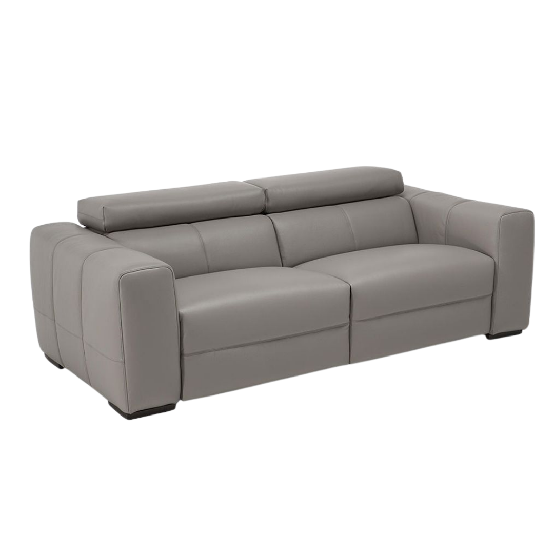 Natuzzi Italia indoor furniture including lounge armchairs, coffee tables, side tables, and bedside tables at Royal Interiors Singapore showroom.