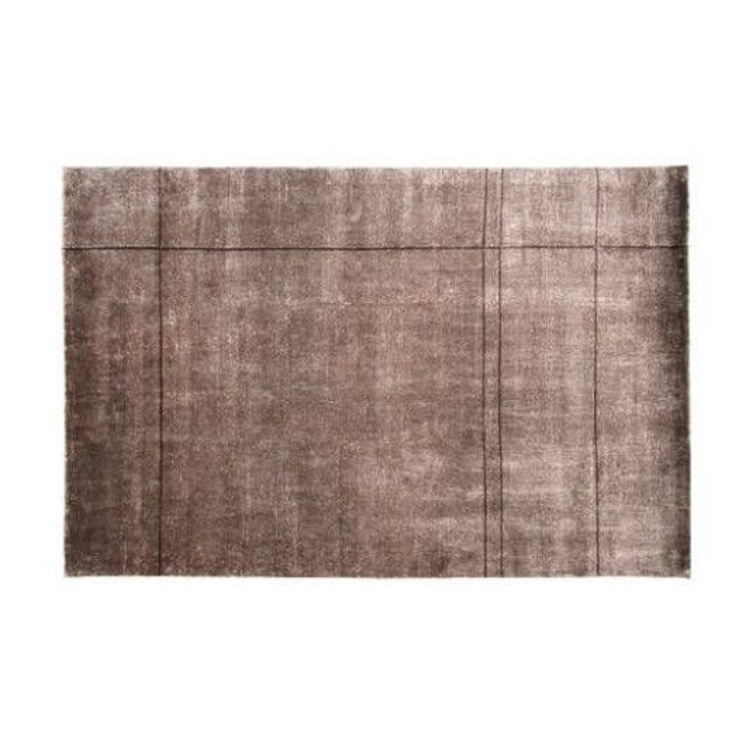 Natuzzi Italia indoor furniture including lounge armchairs, coffee tables, side tables, and bedside tables at Royal Interiors Singapore showroom.