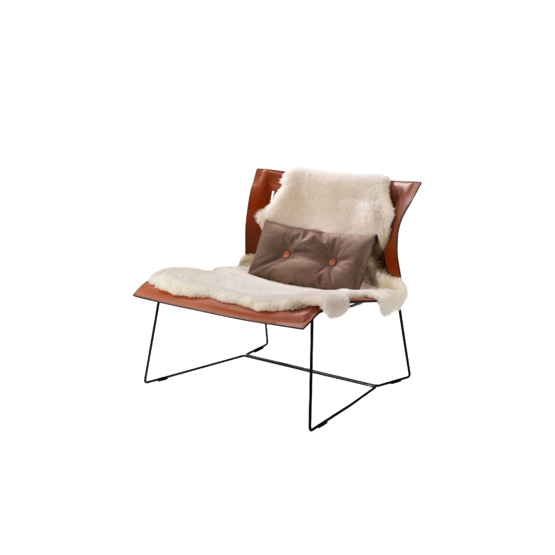 Luxury lounge armchair from Royal Interiors Singapore — designer seating crafted for modern comfort and timeless style.