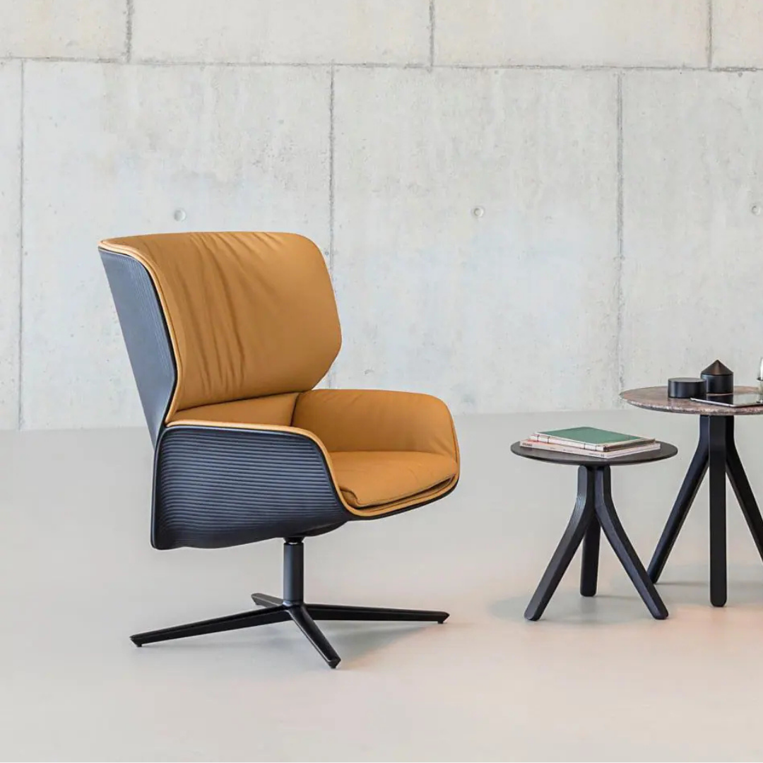 Luxury lounge armchair from Royal Interiors Singapore — designer seating crafted for modern comfort and timeless style.