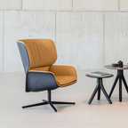 Luxury lounge armchair from Royal Interiors Singapore — designer seating crafted for modern comfort and timeless style.