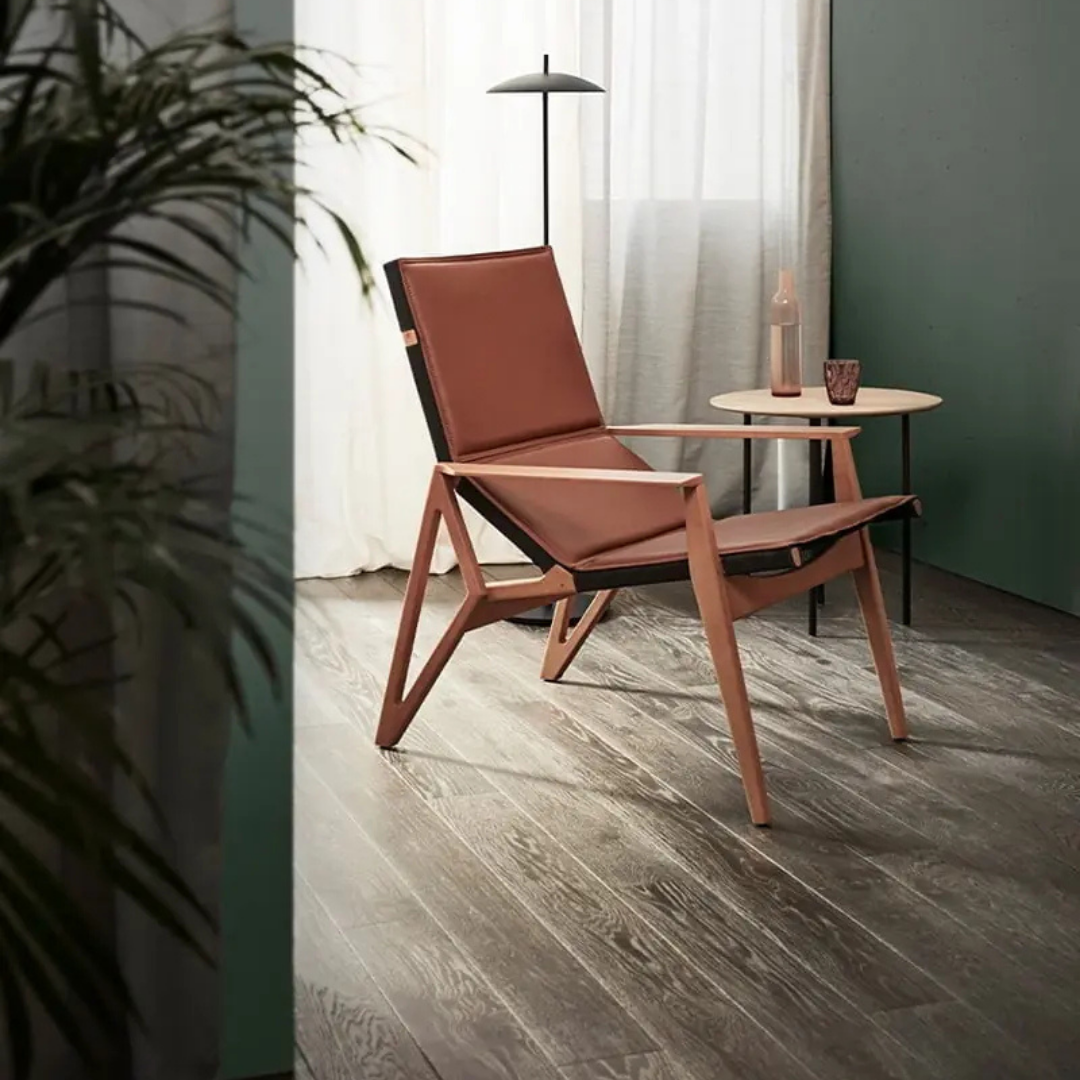 Luxury lounge armchair from Royal Interiors Singapore — designer seating crafted for modern comfort and timeless style.