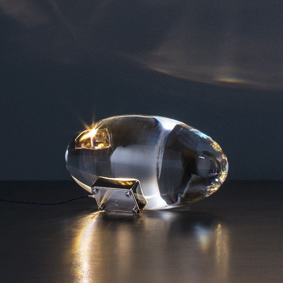 Catellani & Smith sculptural lighting displayed at Royal Interiors Singapore showroom, creating a warm and atmospheric setting for Chinese New Year interiors.