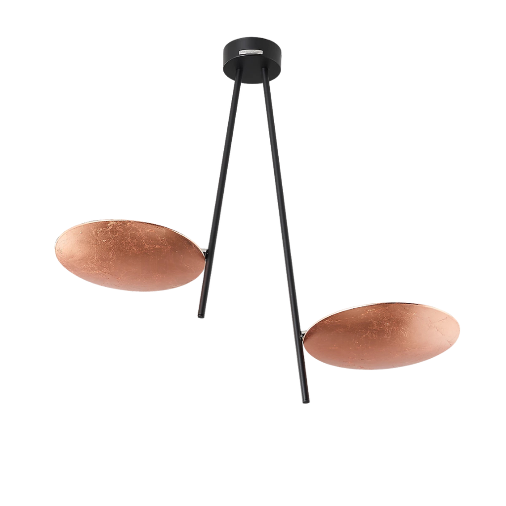 Catellani & Smith sculptural lighting displayed at Royal Interiors Singapore showroom, creating a warm and atmospheric setting for Chinese New Year interiors.