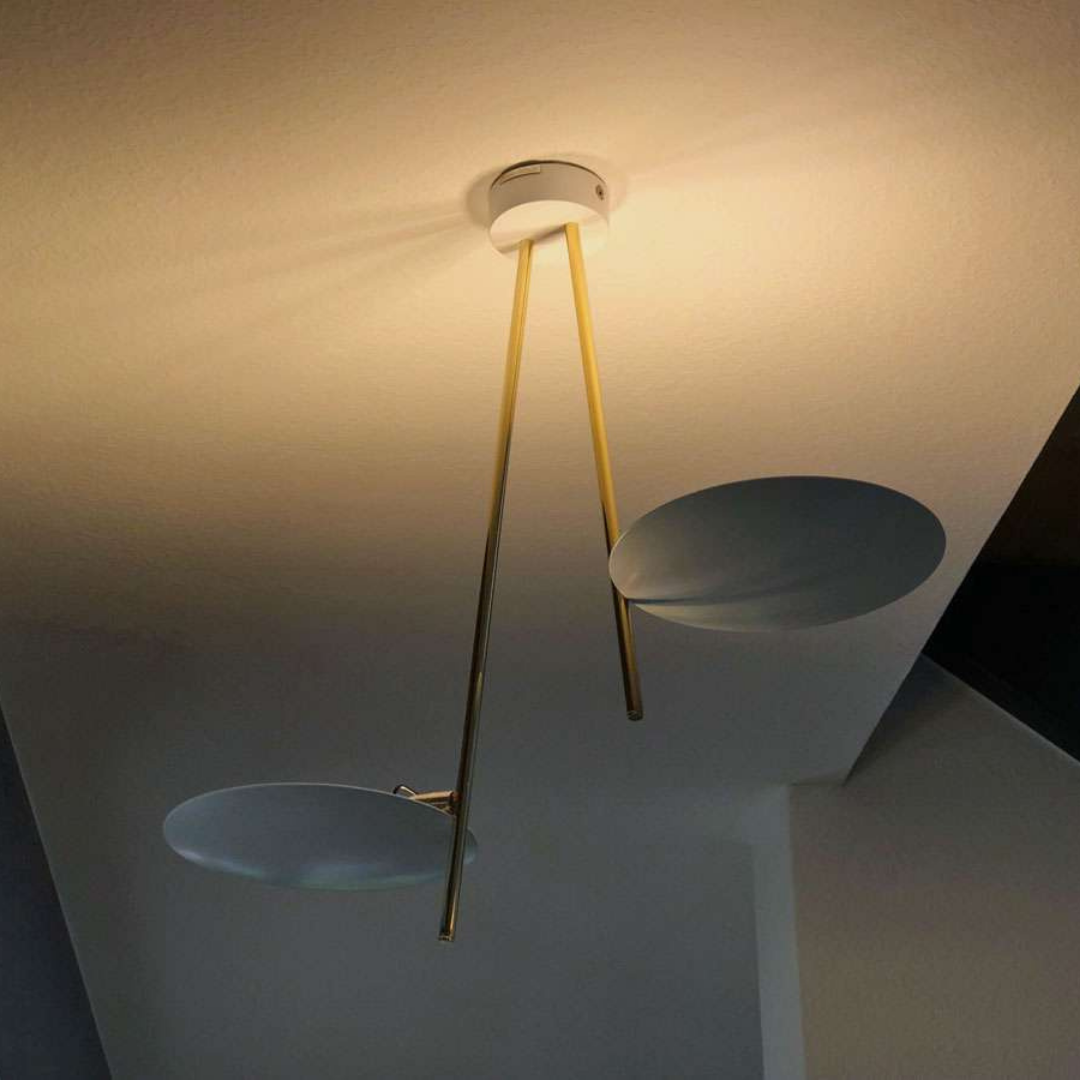 Catellani & Smith sculptural lighting displayed at Royal Interiors Singapore showroom, creating a warm and atmospheric setting for Chinese New Year interiors.