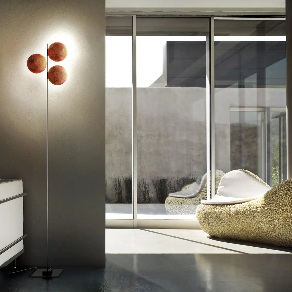 Catellani & Smith sculptural lighting displayed at Royal Interiors Singapore showroom, creating a warm and atmospheric setting for Chinese New Year interiors.