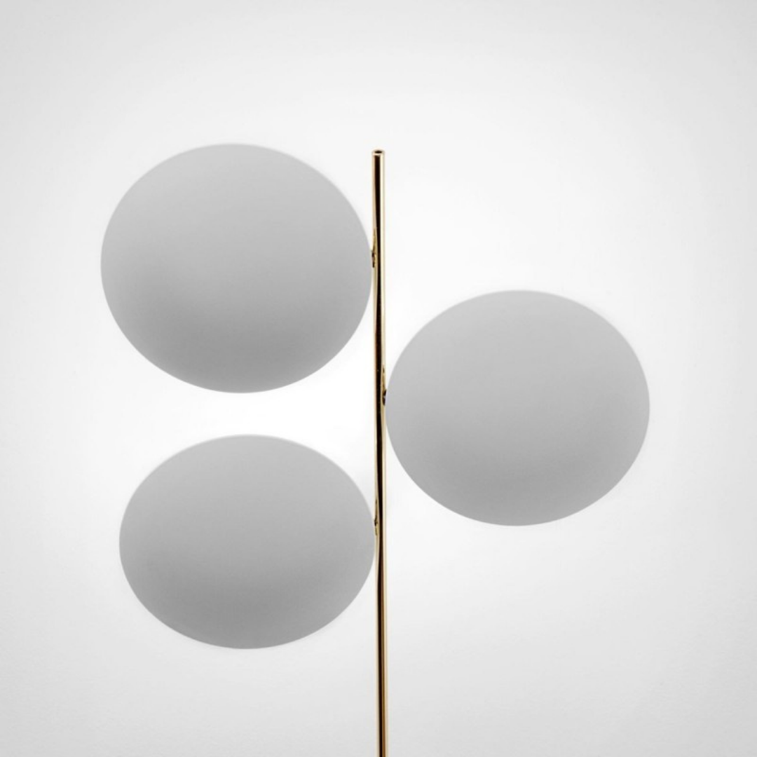 Catellani & Smith sculptural lighting displayed at Royal Interiors Singapore showroom, creating a warm and atmospheric setting for Chinese New Year interiors.