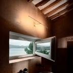 Catellani & Smith sculptural lighting displayed at Royal Interiors Singapore showroom, creating a warm and atmospheric setting for Chinese New Year interiors.