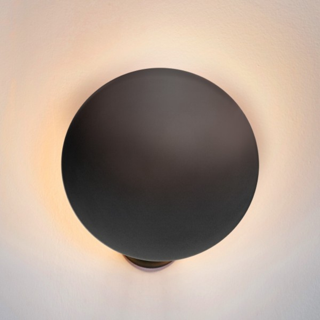 Catellani & Smith sculptural lighting displayed at Royal Interiors Singapore showroom, creating a warm and atmospheric setting for Chinese New Year interiors.