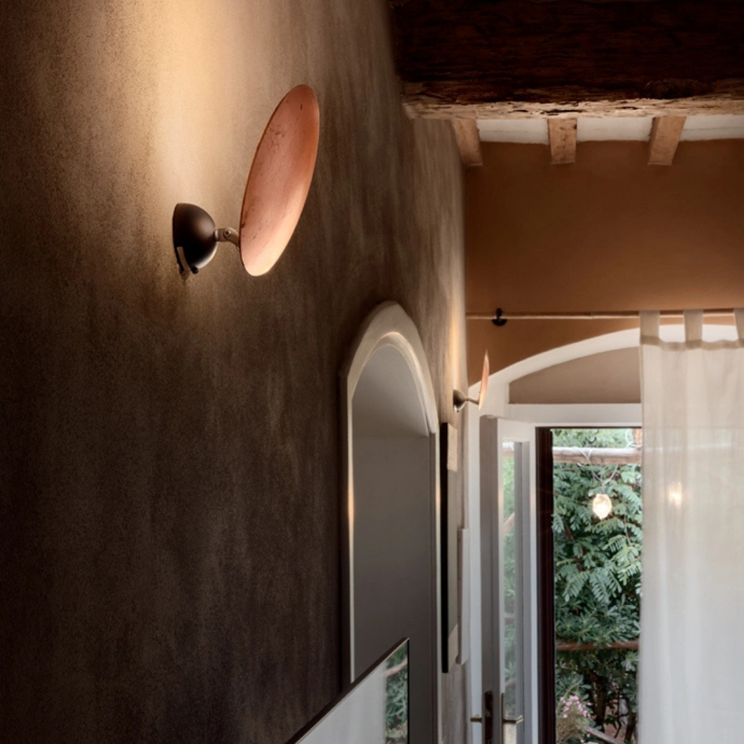 Catellani & Smith sculptural lighting displayed at Royal Interiors Singapore showroom, creating a warm and atmospheric setting for Chinese New Year interiors.