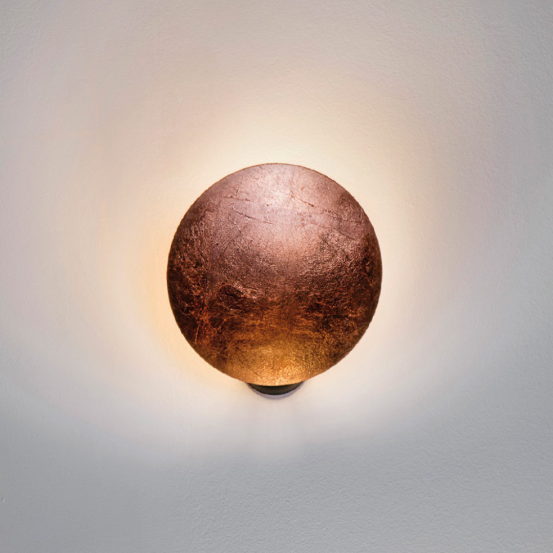 Catellani & Smith sculptural lighting displayed at Royal Interiors Singapore showroom, creating a warm and atmospheric setting for Chinese New Year interiors.