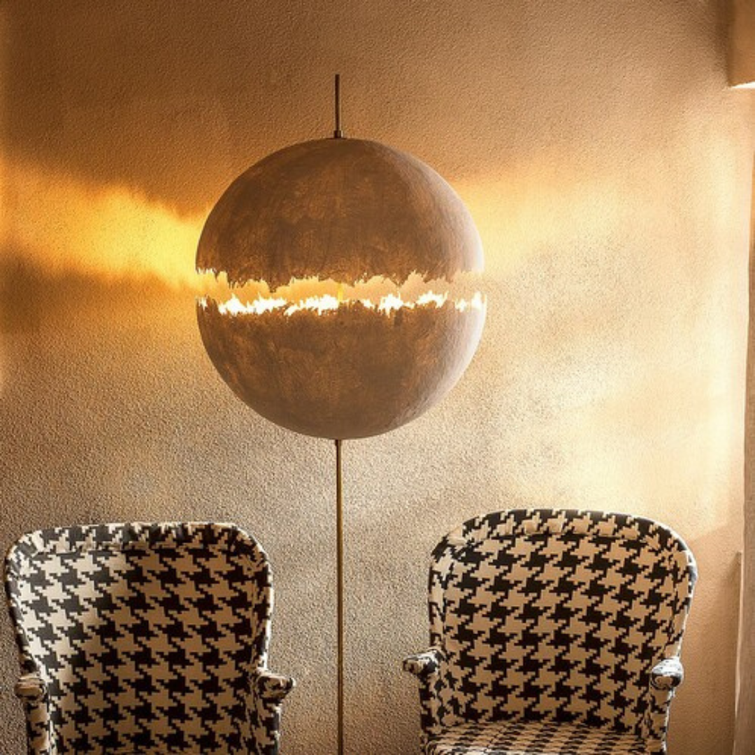 Catellani & Smith sculptural lighting displayed at Royal Interiors Singapore showroom, creating a warm and atmospheric setting for Chinese New Year interiors.