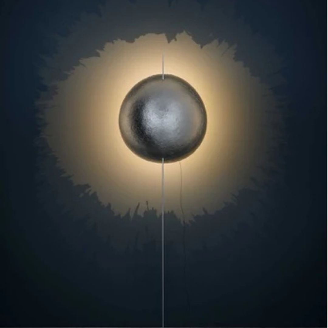 Catellani & Smith sculptural lighting displayed at Royal Interiors Singapore showroom, creating a warm and atmospheric setting for Chinese New Year interiors.