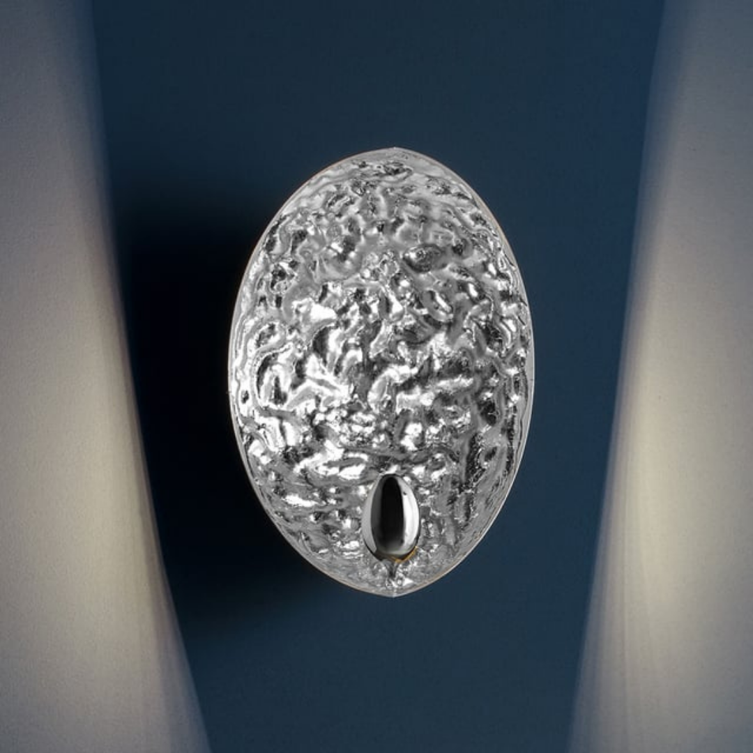 Catellani & Smith sculptural lighting displayed at Royal Interiors Singapore showroom, creating a warm and atmospheric setting for Chinese New Year interiors.