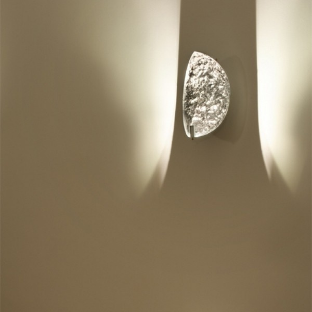 Catellani & Smith sculptural lighting displayed at Royal Interiors Singapore showroom, creating a warm and atmospheric setting for Chinese New Year interiors.