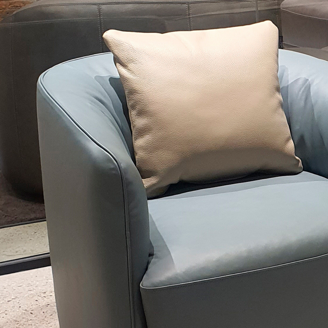 Luxury lounge armchair from Royal Interiors Singapore — designer seating crafted for modern comfort and timeless style.