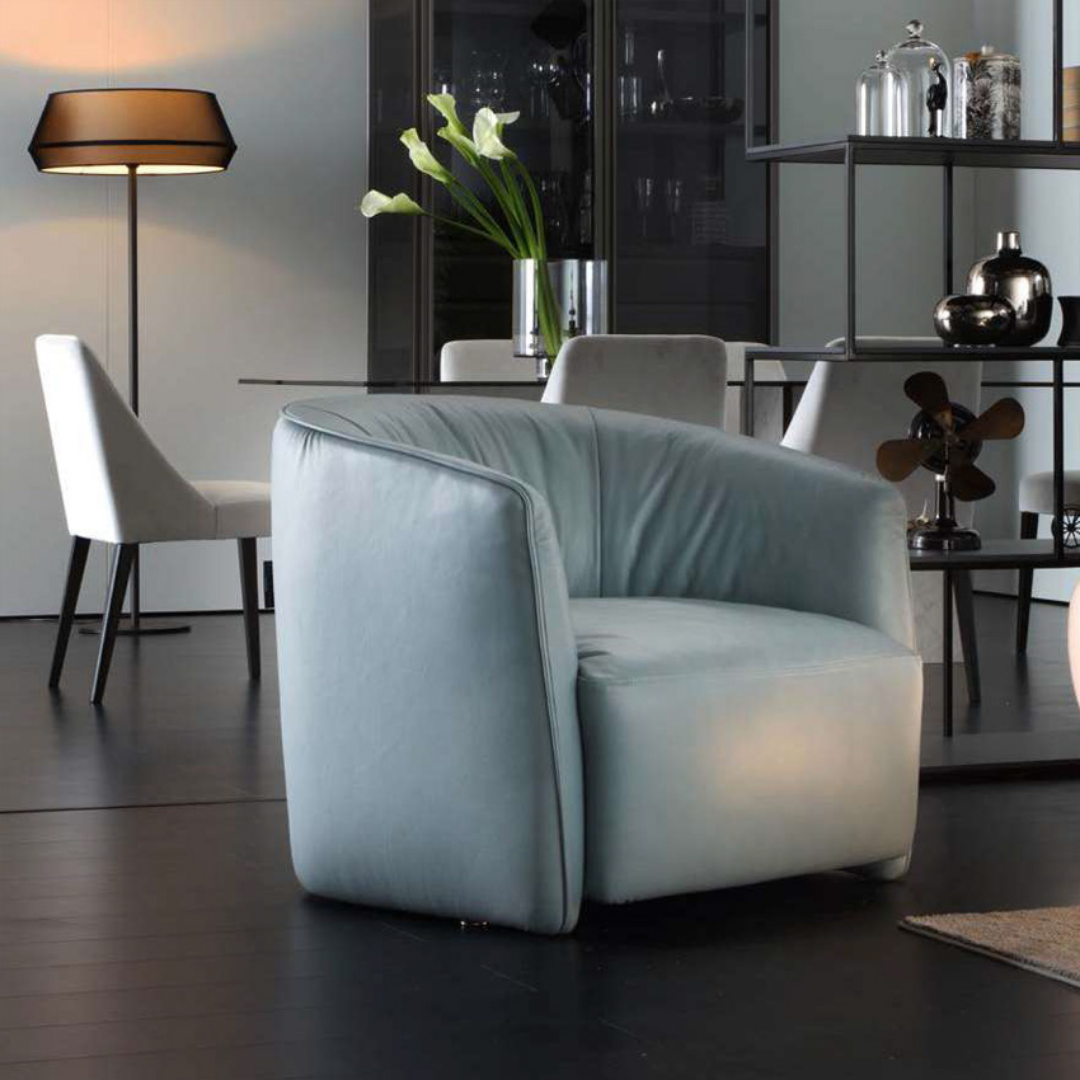 Luxury lounge armchair from Royal Interiors Singapore — designer seating crafted for modern comfort and timeless style.