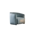 Luxury lounge armchair from Royal Interiors Singapore — designer seating crafted for modern comfort and timeless style.