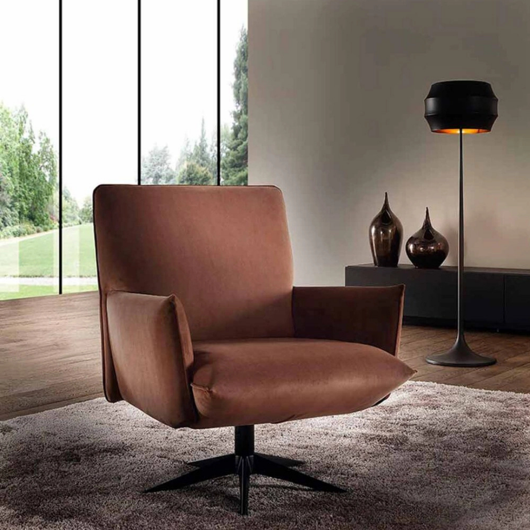 Luxury lounge armchair from Royal Interiors Singapore — designer seating crafted for modern comfort and timeless style.