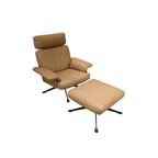 Luxury lounge armchair from Royal Interiors Singapore — designer seating crafted for modern comfort and timeless style.