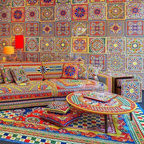 Dolce & Gabbana Casa furniture featuring Carretto or Blu Mediterraneo motifs at Royal Interiors Singapore.