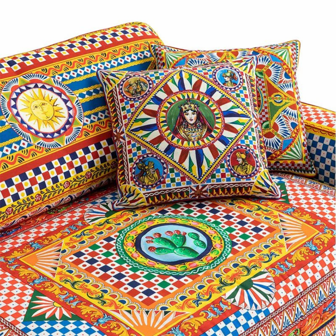 Dolce & Gabbana Casa furniture featuring Carretto or Blu Mediterraneo motifs at Royal Interiors Singapore.