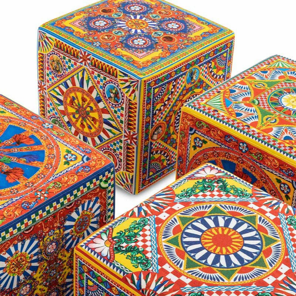 Dolce & Gabbana Casa furniture featuring Carretto or Blu Mediterraneo motifs at Royal Interiors Singapore.