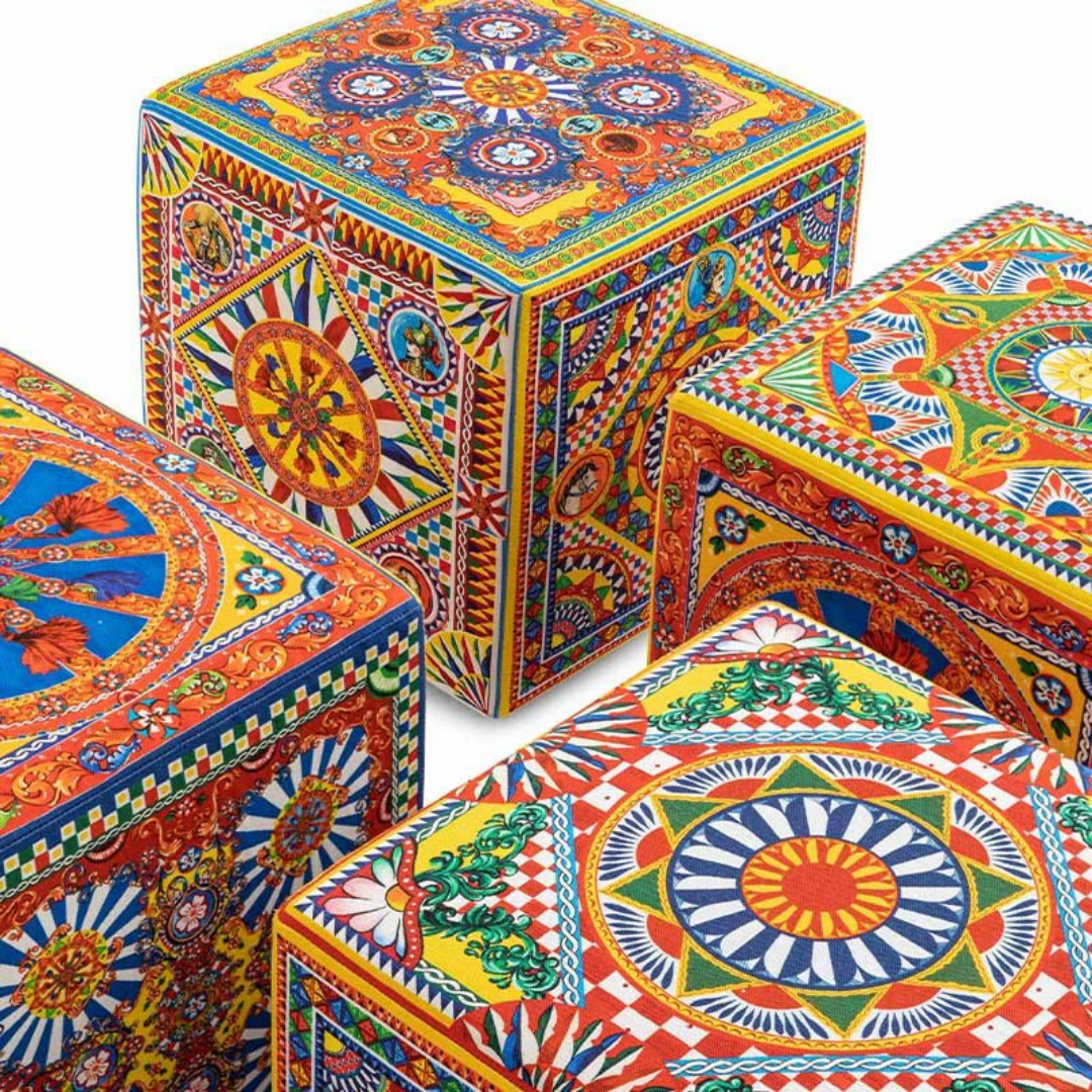 Dolce & Gabbana Casa furniture featuring Carretto or Blu Mediterraneo motifs at Royal Interiors Singapore.