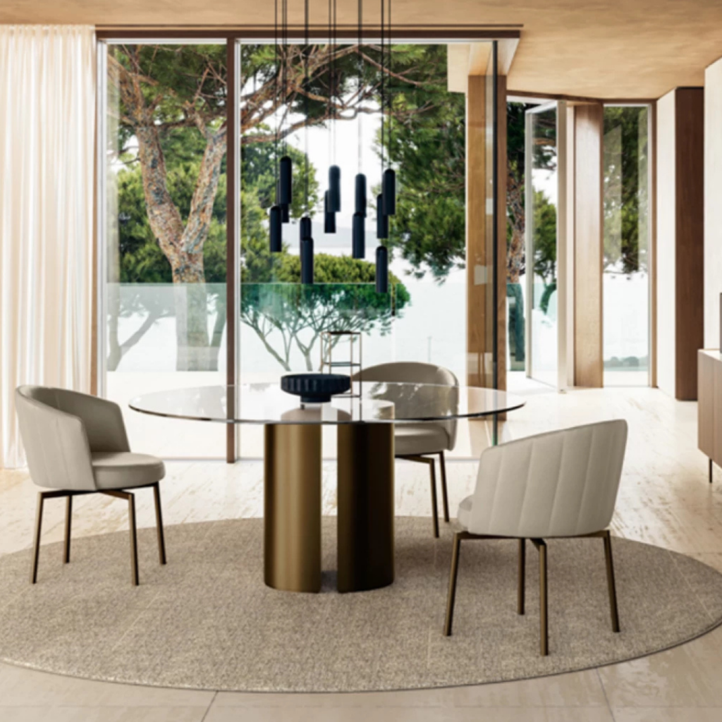 Eforma contemporary Italian furniture featuring sculptural tables and seating crafted in glass, marble, metal, and wood, displayed at Royal Interiors Singapore showroom