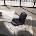 Eforma contemporary Italian furniture featuring sculptural tables and seating crafted in glass, marble, metal, and wood, displayed at Royal Interiors Singapore showroom