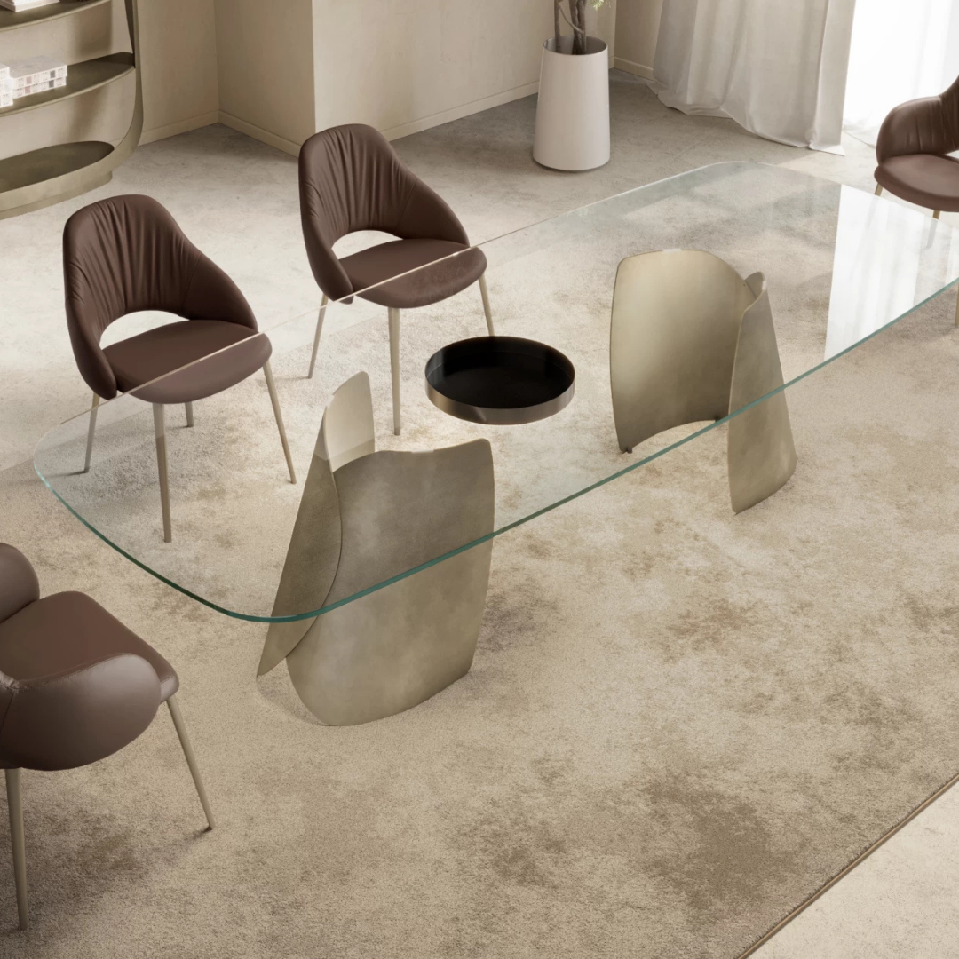 Eforma contemporary Italian furniture featuring sculptural tables and seating crafted in glass, marble, metal, and wood, displayed at Royal Interiors Singapore showroom