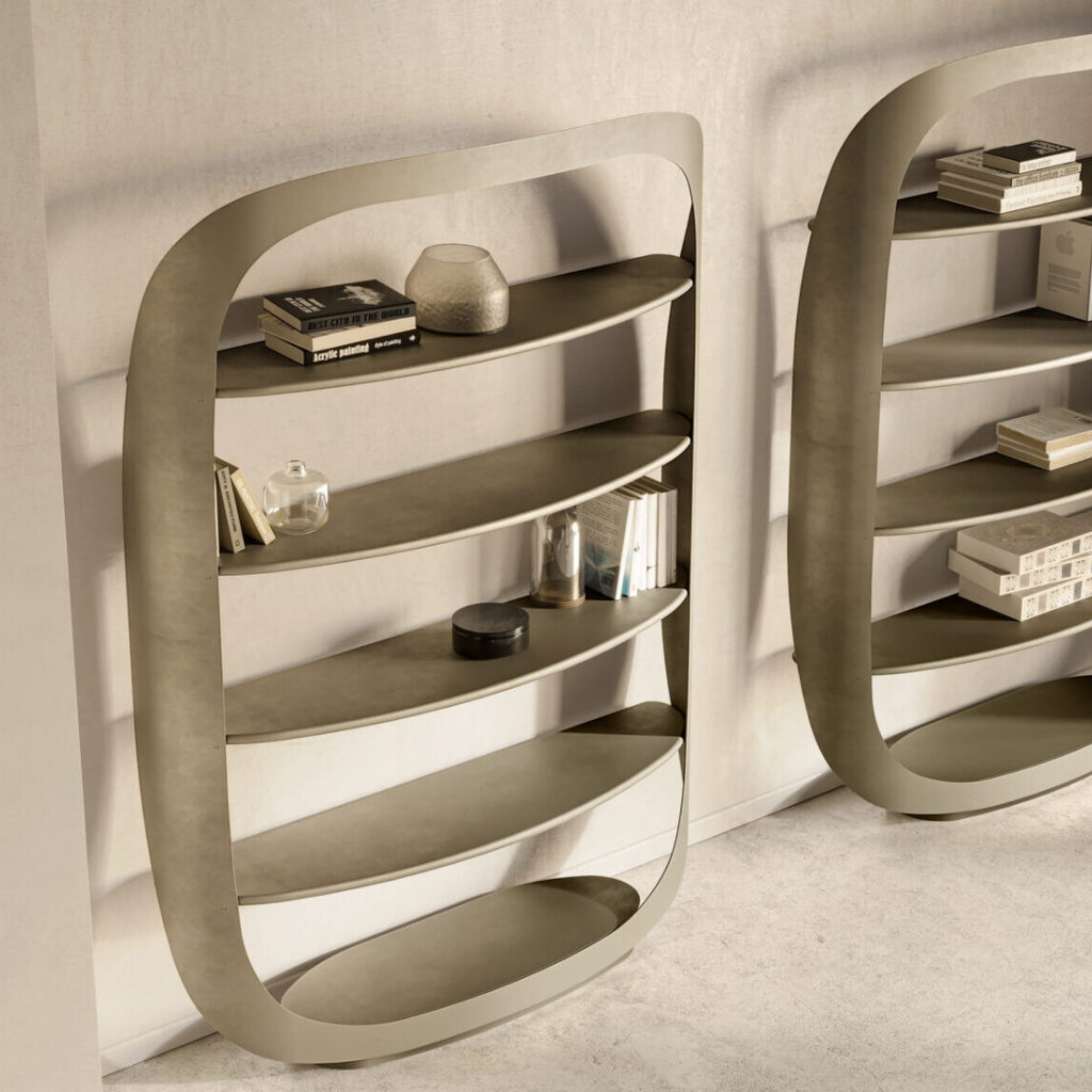 Eforma contemporary Italian furniture featuring sculptural tables and seating crafted in glass, marble, metal, and wood, displayed at Royal Interiors Singapore showroom