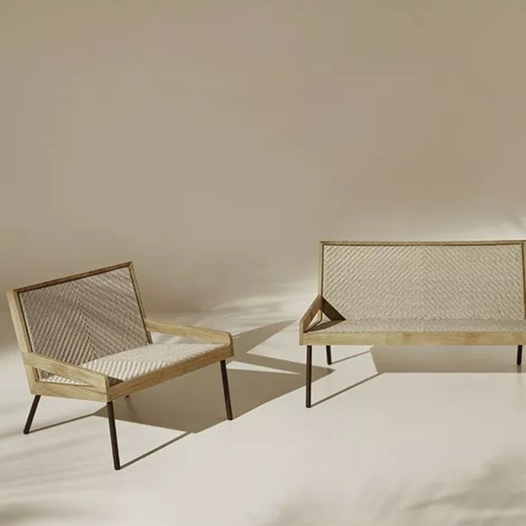 Ethimo Italian outdoor furniture in teak and refined finishes, displayed at Royal Interiors Singapore showroom