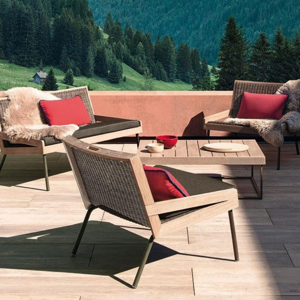 Ethimo Italian outdoor furniture in teak and refined finishes, displayed at Royal Interiors Singapore showroom