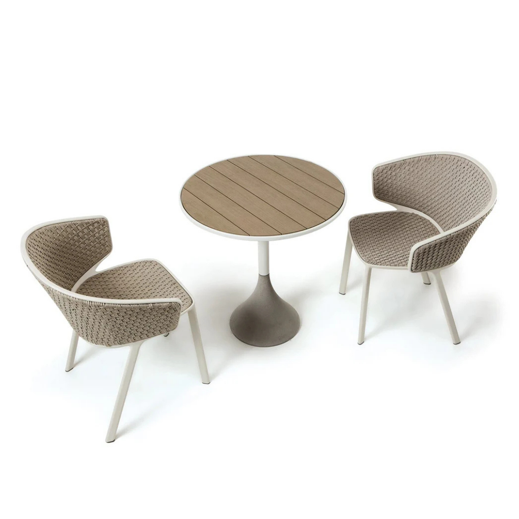 Ethimo Italian outdoor furniture in teak and refined finishes, displayed at Royal Interiors Singapore showroom