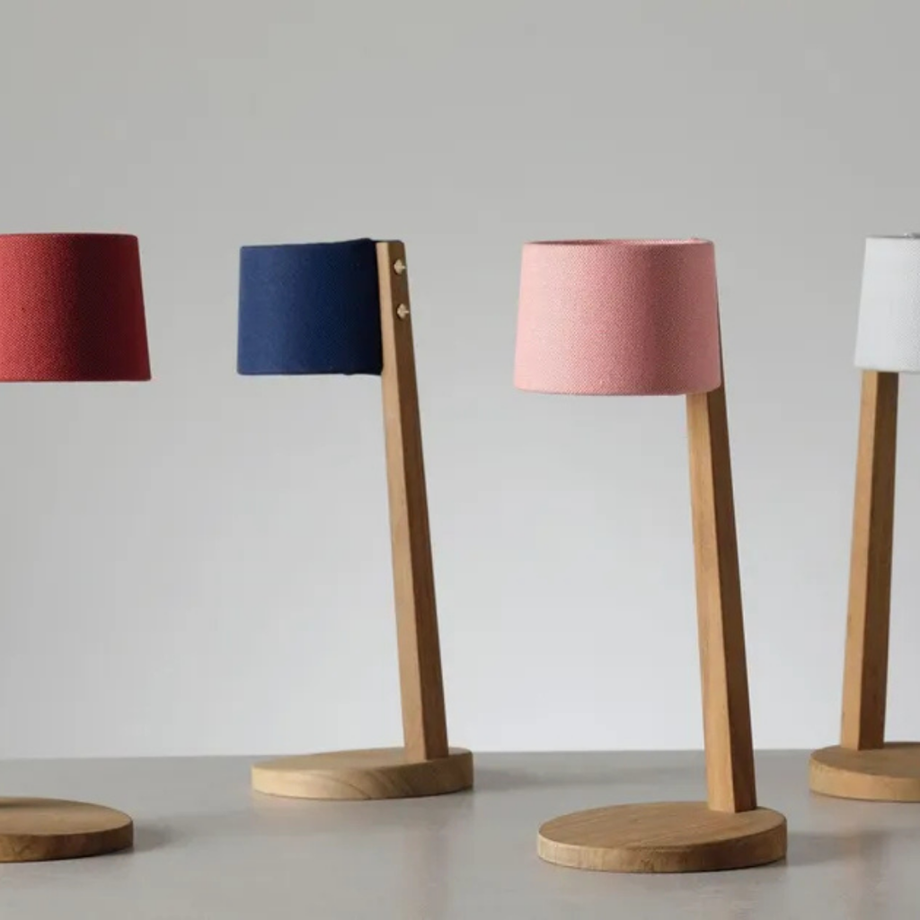 Ethimo Italian outdoor furniture in teak and refined finishes, displayed at Royal Interiors Singapore showroom