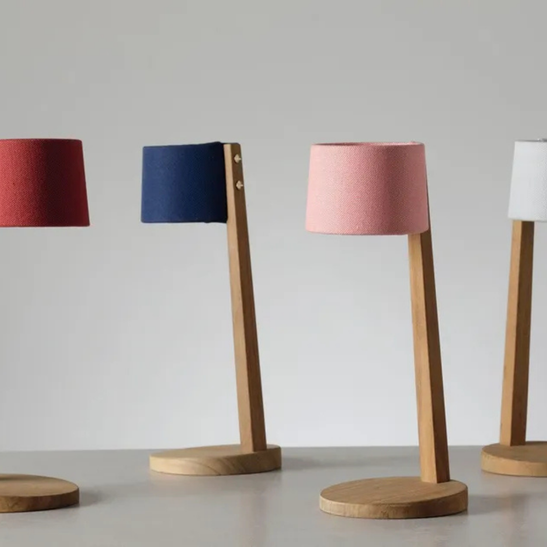 Ethimo Italian outdoor furniture in teak and refined finishes, displayed at Royal Interiors Singapore showroom