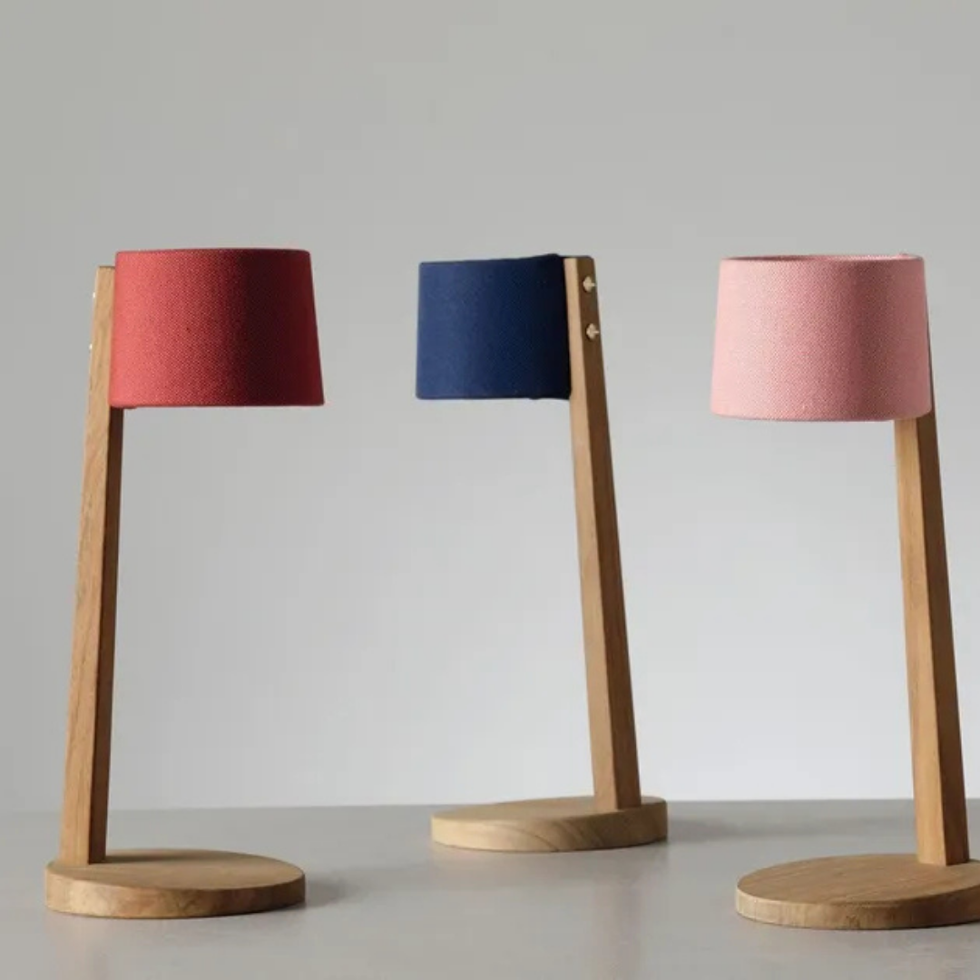 Ethimo Italian outdoor furniture in teak and refined finishes, displayed at Royal Interiors Singapore showroom