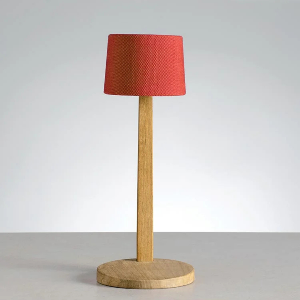 Ethimo Italian outdoor furniture in teak and refined finishes, displayed at Royal Interiors Singapore showroom