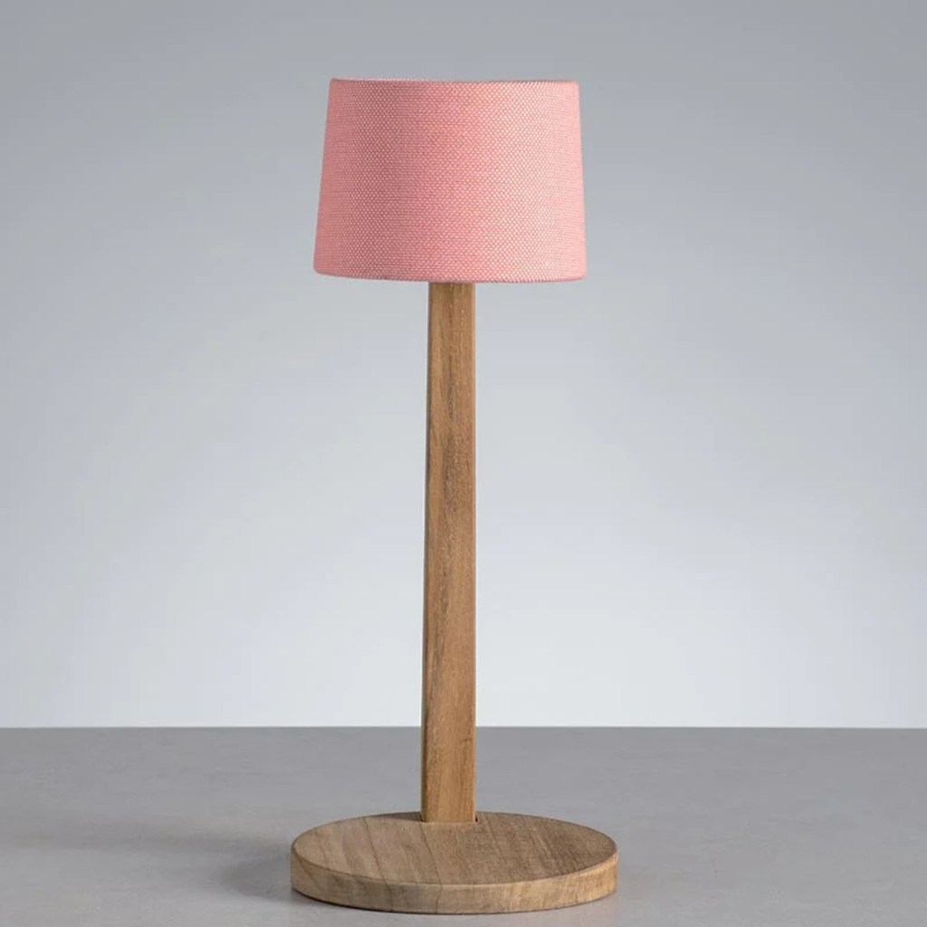 Ethimo Italian outdoor furniture in teak and refined finishes, displayed at Royal Interiors Singapore showroom