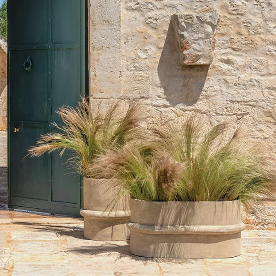 Ethimo Italian outdoor furniture in teak and refined finishes, displayed at Royal Interiors Singapore showroom