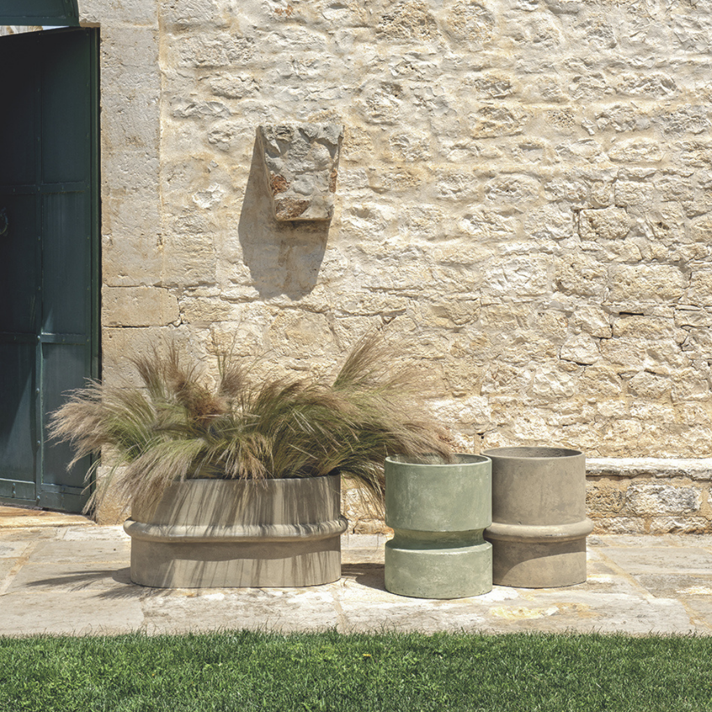 Ethimo Italian outdoor furniture in teak and refined finishes, displayed at Royal Interiors Singapore showroom