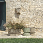 Ethimo Italian outdoor furniture in teak and refined finishes, displayed at Royal Interiors Singapore showroom