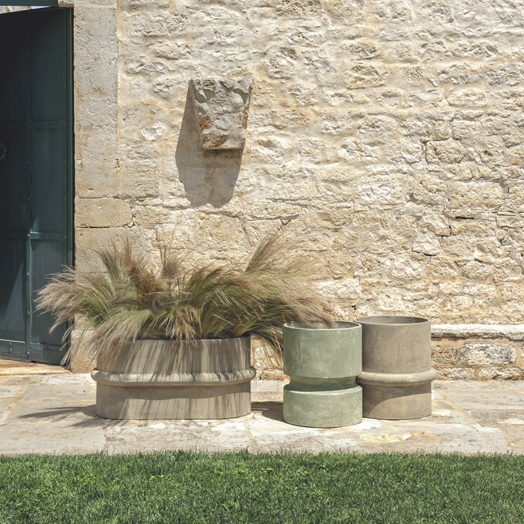 Ethimo Italian outdoor furniture in teak and refined finishes, displayed at Royal Interiors Singapore showroom