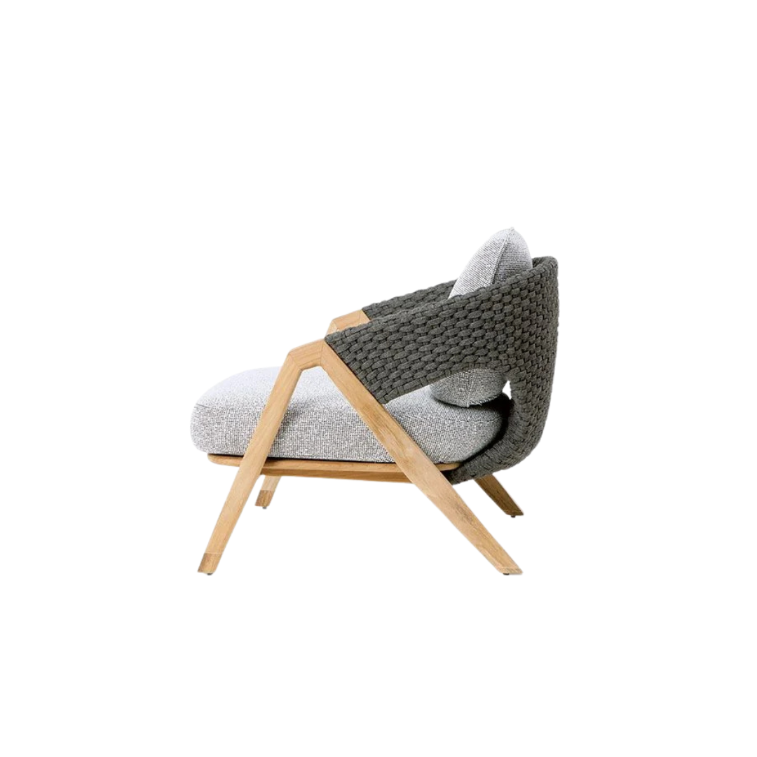 Ethimo Italian outdoor furniture in teak and refined finishes, displayed at Royal Interiors Singapore showroom