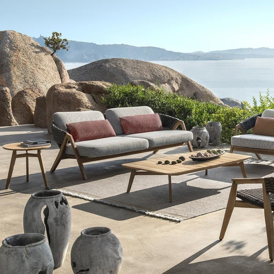 Ethimo Italian outdoor furniture in teak and refined finishes, displayed at Royal Interiors Singapore showroom