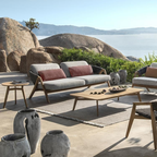 Ethimo Italian outdoor furniture in teak and refined finishes, displayed at Royal Interiors Singapore showroom