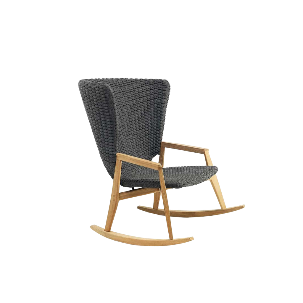 Ethimo Italian outdoor furniture in teak and refined finishes, displayed at Royal Interiors Singapore showroom