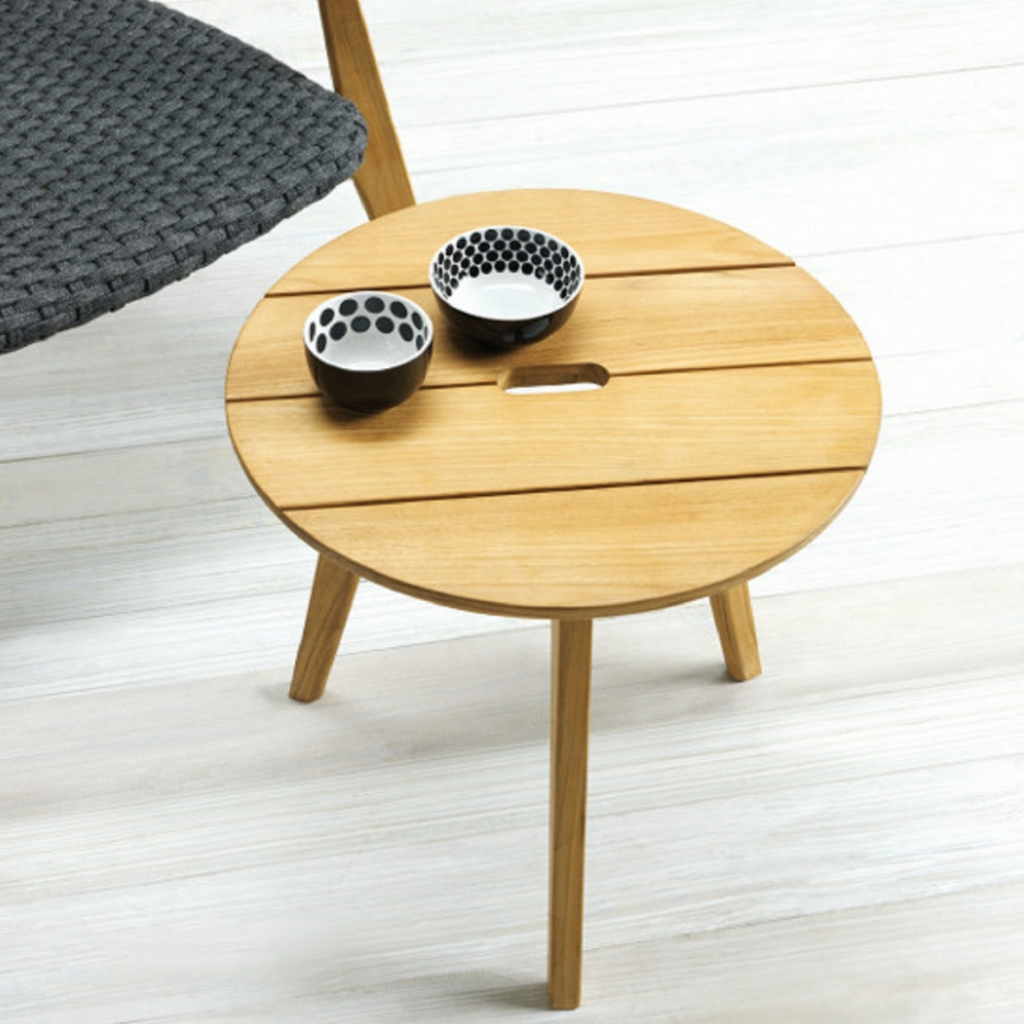 Ethimo Italian outdoor furniture in teak and refined finishes, displayed at Royal Interiors Singapore showroom